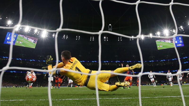 Tottenham's Hugo Lloris saves a penalty from Manchester City's Sergio Aguero. Reuters