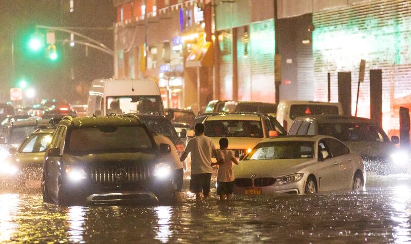 Cars stuck on a street flooded by heavy rain as remnants of Hurricane Ida hit the area in the Queens borough of New York, New York. EPA
