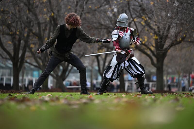 It's only the first day and already tempers are flaring; two cosplayers settled their differences during a simulation fight.