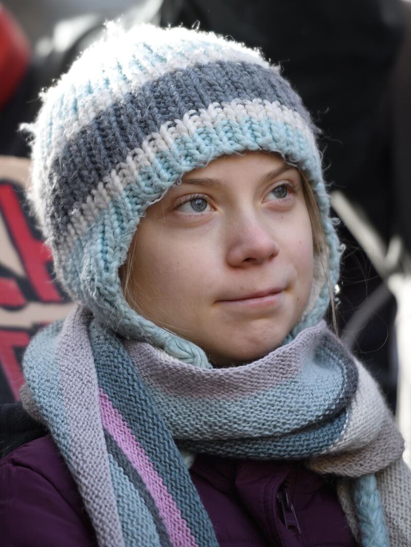 Swedish climate activist Greta Thunberg takes part in a "Friday for future" youth demonstration in a street of Davos on January 24, 2020 on the sideline of the World Economic Forum (WEF) annual meeting. Teenage climate activist said calls to the corporate elite meeting in Davos to disinvest immediately in fossil fuels had been ignored.  / AFP / FABRICE COFFRINI
