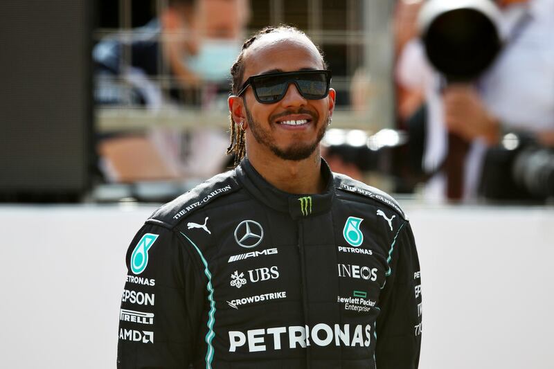 BAHRAIN, BAHRAIN - MARCH 12: Lewis Hamilton of Great Britain and Mercedes GP looks on from the grid during Day One of F1 Testing at Bahrain International Circuit on March 12, 2021 in Bahrain, Bahrain. (Photo by Joe Portlock/Getty Images)