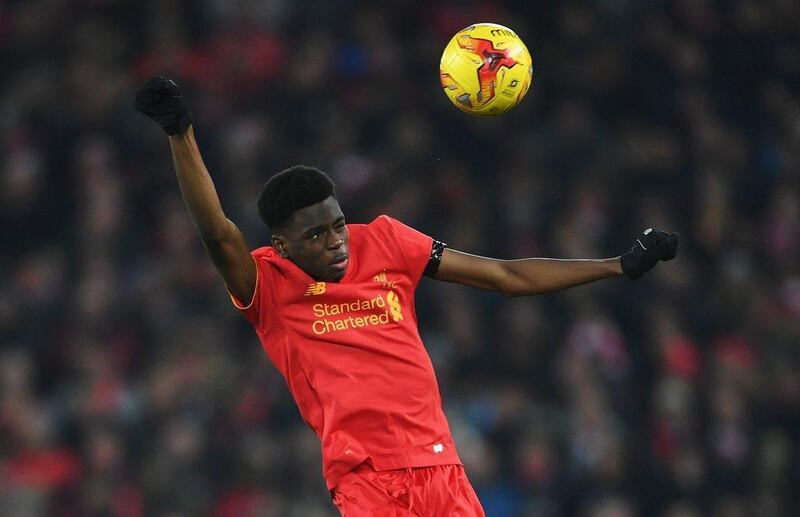 Ovie Ejaria of Liverpool jumps for a header. Laurence Griffiths / Getty Images