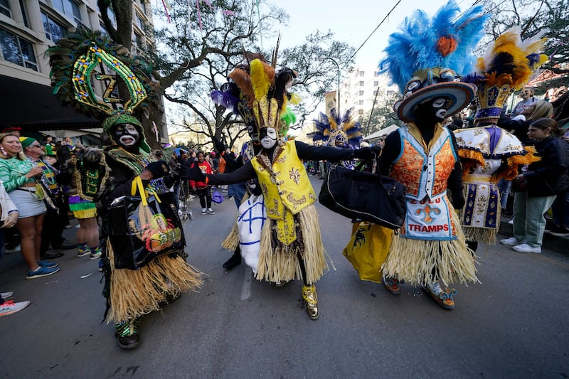 Members of the Zulu Tramps dance at the Krewe of Zulu parade during Mardi Gras in New Orleans. AP