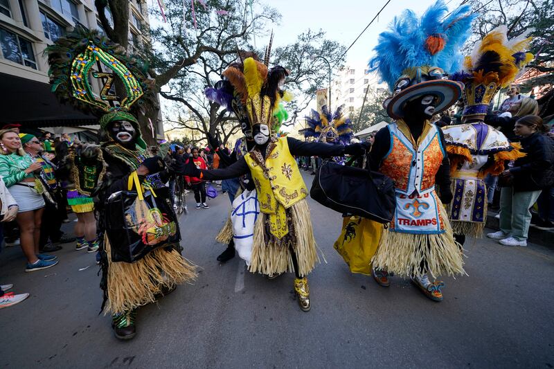 Members of the Zulu Tramps dance at the Krewe of Zulu parade during Mardi Gras in New Orleans. AP