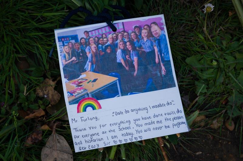 Tributes to the murdered school teacher James Furlong are seen outside The Holt School, on June 22, 2020 in Wokingham, England. Getty Images