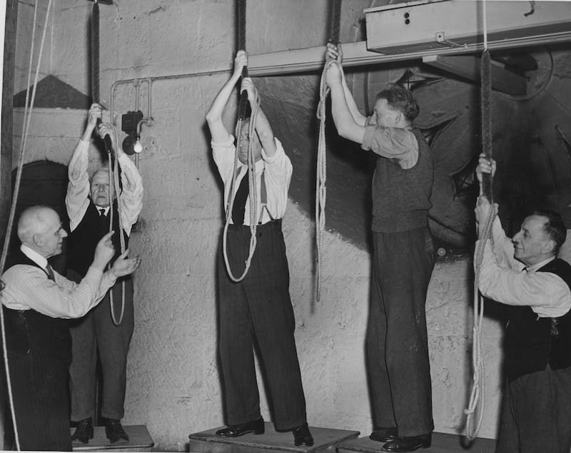 Westminster Abbey's team of bell ringers practising their royal wedding peal in 1947