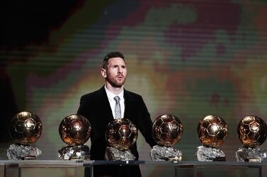 epa08556640 (FILE) - The Men's 2019 Ballon d'Or winner Barcelona forward Lionel Messi stands behind his six Ballon d'Or trophies during the ceremony at Theatre du Chatelet in Paris, France, 02 December 2019 (reissued 20 July 2020). France Football on 20 July 2020 announced that no Ballon d'Or winner will be announced for 2020 citing a 'lack of sufficient fair conditions' in a year that saw a coronavirus pandemic. EPA/YOAN VALAT *** Local Caption *** 55677199