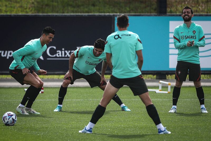 Left to right: Cristiano Ronaldo, Goncalo Guedes and Bernardo Silva during training. AFP