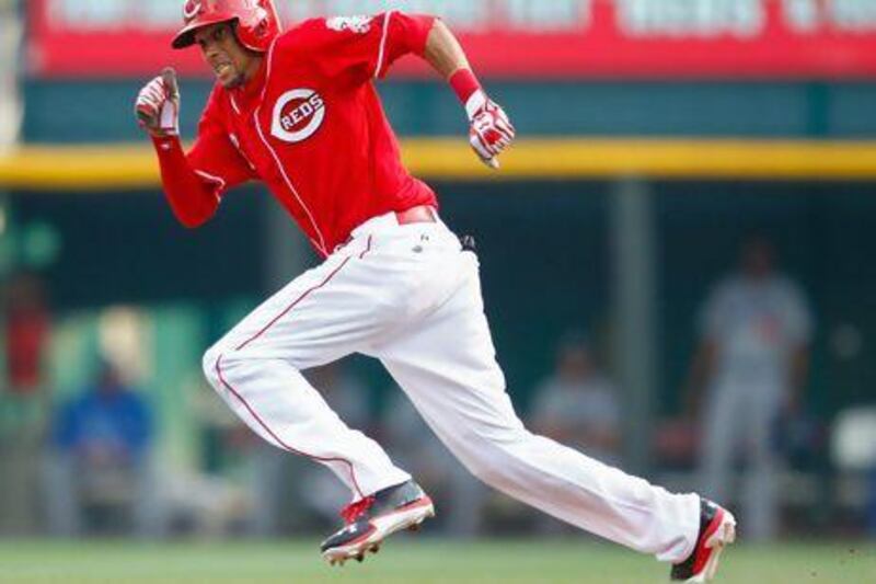 The September call-up Billy Hamilton, who set the minor-league record with 155 stolen bases in 2012, stole second base and scored the winning run twice in his first five days with the Reds. Michael Hickey / Getty Images