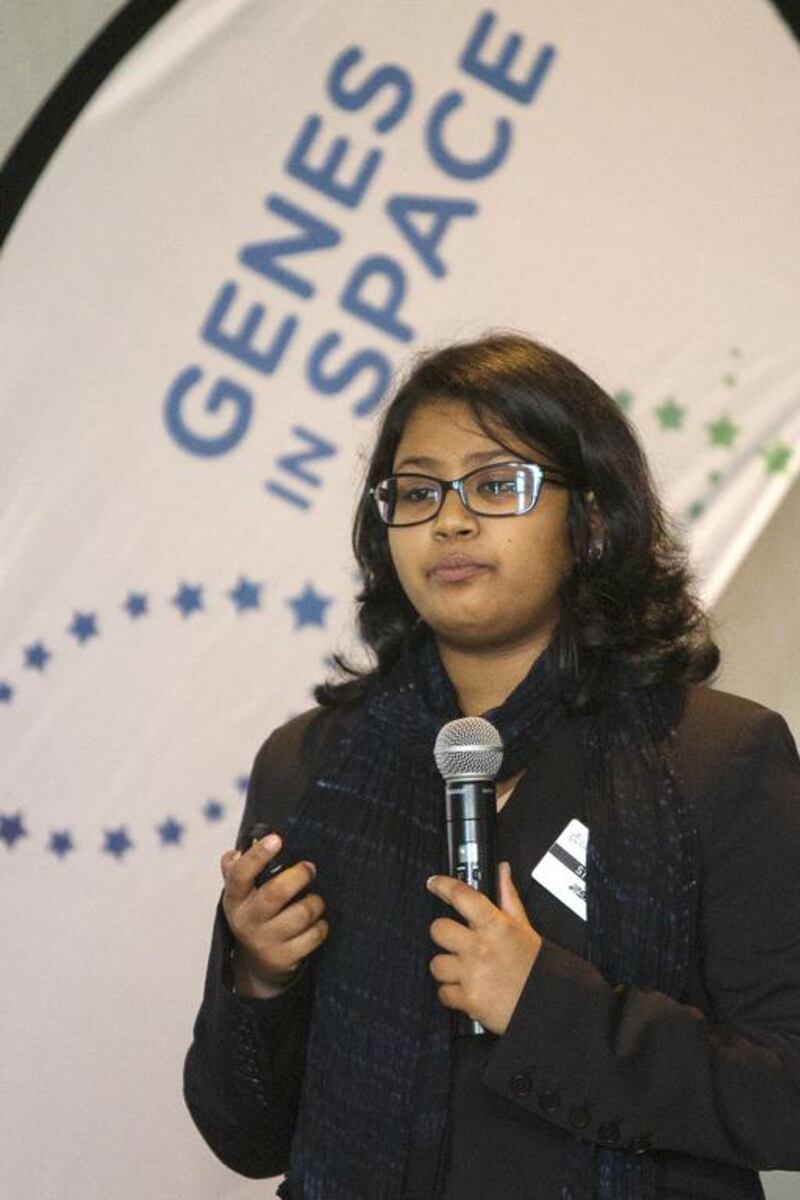 Finalist Haneefah Badar, from Brighton College in Abu Dhabi, presents her project at the Global Space Congress in Abu Dhabi. Christopher Pike / The National