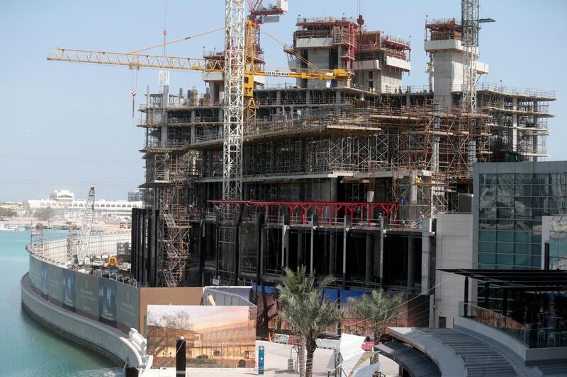 Construction work on the 35-storey property on Al Maryah Island started last year after developer Mubadala awarded a Dh730 million contract to design and build the project to Al Futtaim Carillion. Christopher Pike / The National