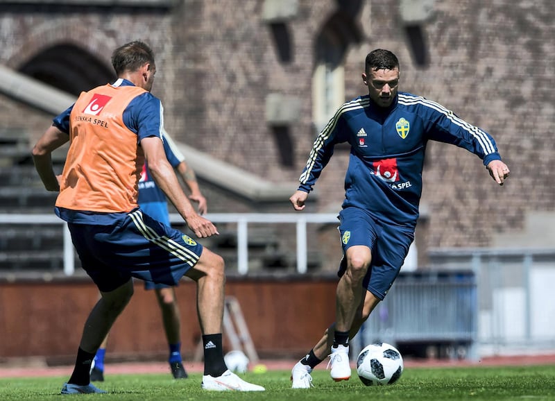 Sweden's forward Marcus Berg (R) and Sweden's defender Andreas Granqvist take part in a training session, in preparation for the 2018 Football World Cup in Russia on May 24, 2018 in Stockholm.
The Swedish team will stay in Sweden for training until they travel to Russia on June 12. / AFP PHOTO / Jonathan NACKSTRAND