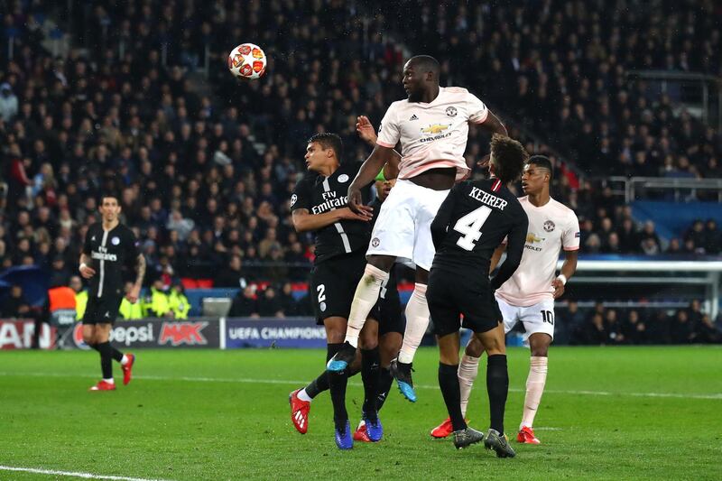 PARIS, FRANCE - MARCH 06:  Romelu Lukaku of Manchester United wins a header during the UEFA Champions League Round of 16 Second Leg match between Paris Saint-Germain and Manchester United at Parc des Princes on March 06, 2019 in Paris, . (Photo by Julian Finney/Getty Images)