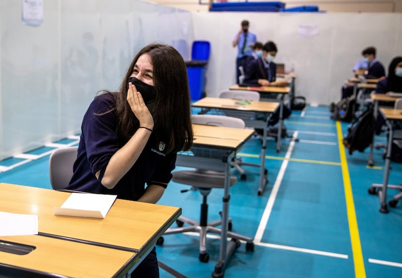 Abu Dhabi, United Arab Emirates, March 3, 2021.  Pupils receive some of their IGCSE and International A-level results for January session 2021. Pupils celebrating after recieving receiving results.
Victor Besa / The National
Section:  NA
Reporter:  Anam Rizvi