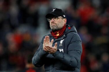 FILE PHOTO: Soccer Football - Champions League - Round of 16 Second Leg - Liverpool v Atletico Madrid - Anfield, Liverpool, Britain - March 11, 2020 Liverpool manager Juergen Klopp looks dejected as he applauds the fans after the match REUTERS/Phil Noble/File Photo
