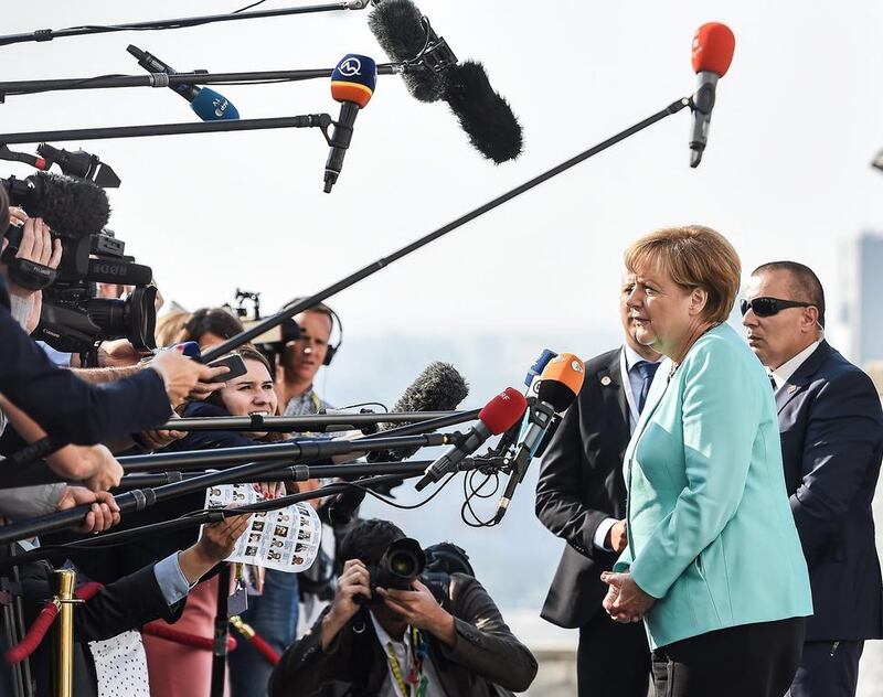 German chancellor Angela Merkel answers media question on September 16, 2016, as she arrives at Bratislava castle for the European Union summit, an informal meeting of the 27 heads of state or government, in Bratislava, Slovakia. EU leaders are scheduled to discuss a new strategy and the future of the bloc after the recent Brexit referendum in Britain. Filip Singer / EPA