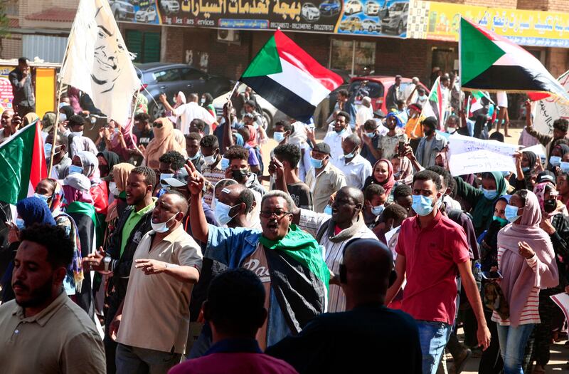 Demonstrators rally against Gen Abdel Fattah Al Burhan, who dismissed a civilian-led government and placed Prime Minister Abdalla Hamdok under house arrest. Mr Hamdok was later reinstated as prime minister. AFP