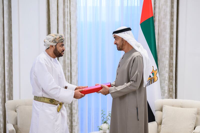 President Sheikh Mohamed accepts a letter from the Sultan of Oman delivered by Sayyid Fatik bin Fahr Al Said, special envoy of the sultan, at Al Shati Palace in Abu Dhabi on September 15, 2022. Photo: UAE Presidential Court 