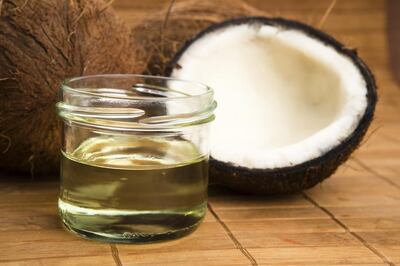 Coconut oil can help speed up fat metabolism while increasing thyroid function. iStockphoto.com