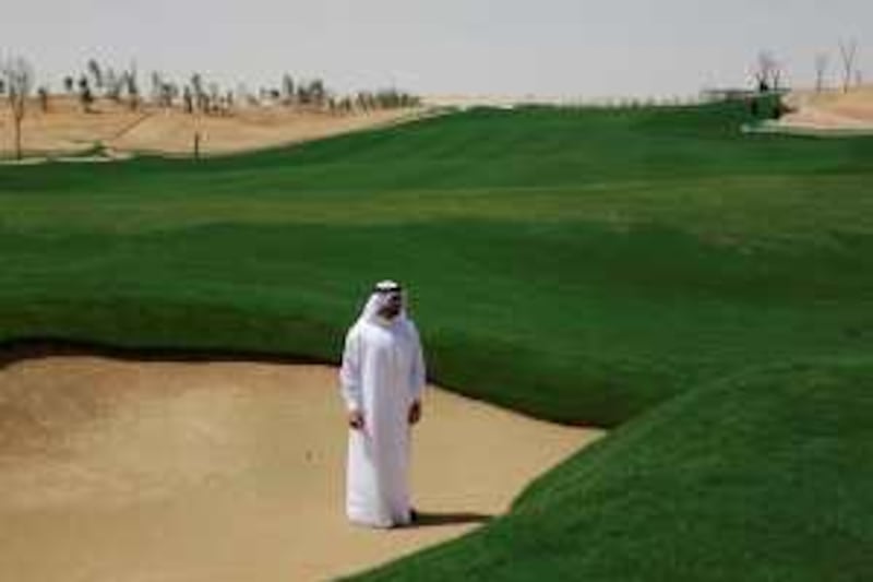 Dubai - March 24, 2009: Abdulla Al Gurg, Project Director for The  Tiger Woods Dubai, poses for a portrait at the 5th hole of the course. ( Philip Cheung / The National )   *** Local Caption ***  PC0067-Tigerwoodsgolf.jpg