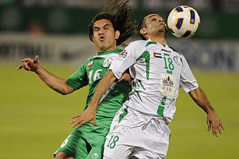 Zob Ahan, in green, beat Emirates 1-0 to secure qualification to the last 16 of the ACL last night.