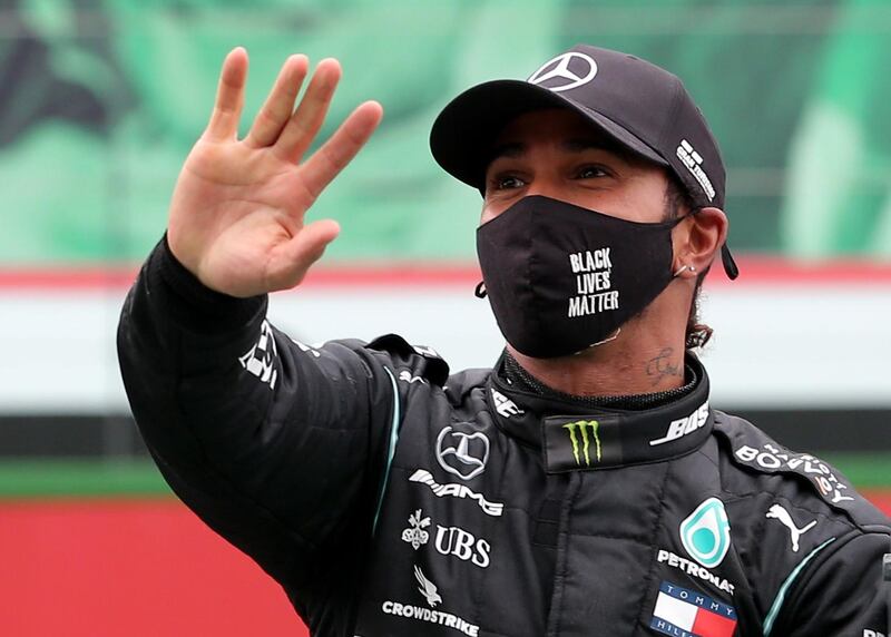 Mercedes' Lewis Hamilton celebrates his victory. Reuters
