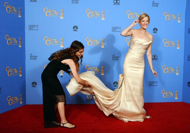 Anna Gunn, right, poses in the press room. AP 