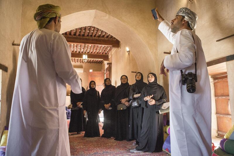 A group of female Omani diploma students practice tour guiding with Bader Thuhli (right), a professor of tour guiding at the Oman Tourism College, the only college in the Sultanate of Oman specializes Tourism & Hospitality.