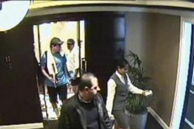 Mahmoud al Mabhouh is followed out of a lift by two alleged Mossad agents.