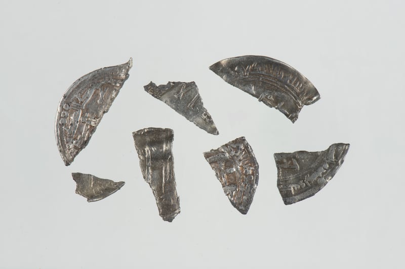 Seven fragments of Arabic silver coins dating back to the 8th century discovered in Norway