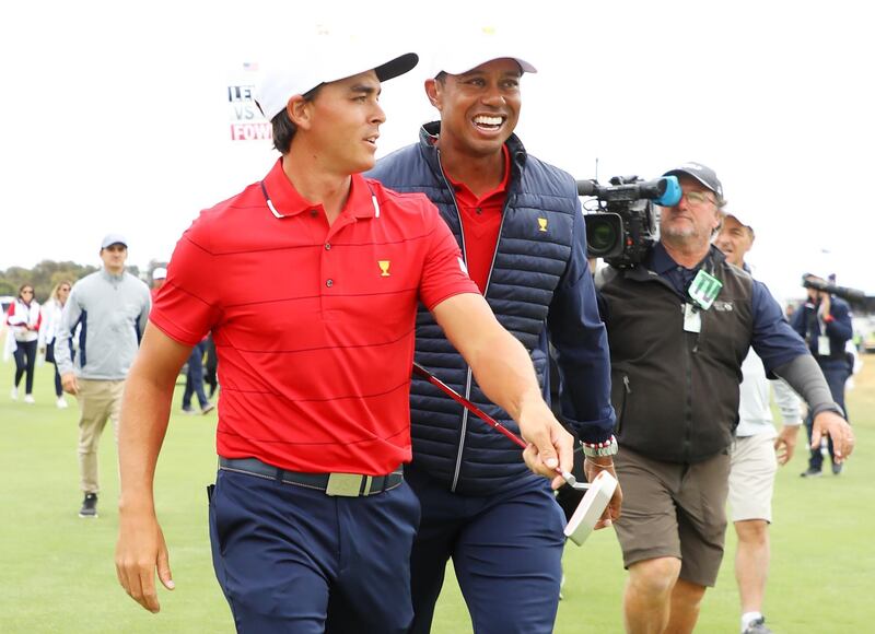 Tiger Woods  and Rickie Fowler of the United States team celebrate after they won the Presidents Cup 16-14. Getty