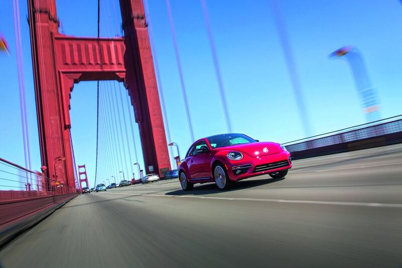 The latest Beetle, pictured on the Golden Gate Bridge in San Francisco, remains a ‘cute’ car, despite the 2014 model’s notably more powerful silhouette and attempts to reposition it as a more ‘masculine’ proposition. Courtesy Volkswagen