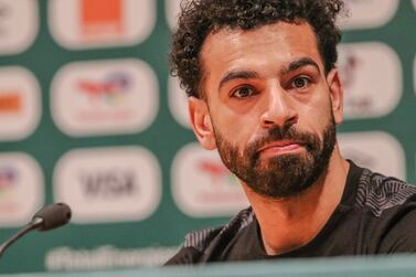 Egypt's captain Mohamed Salah speaks during the pre-match press conference in Garoua on January 10, 2022.  (Photo by Daniel Beloumou Olomo  /  AFP)