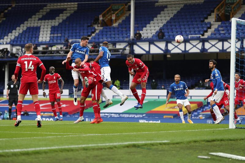 Everton's Michael Keane heads home to make the score 1-1. AFP