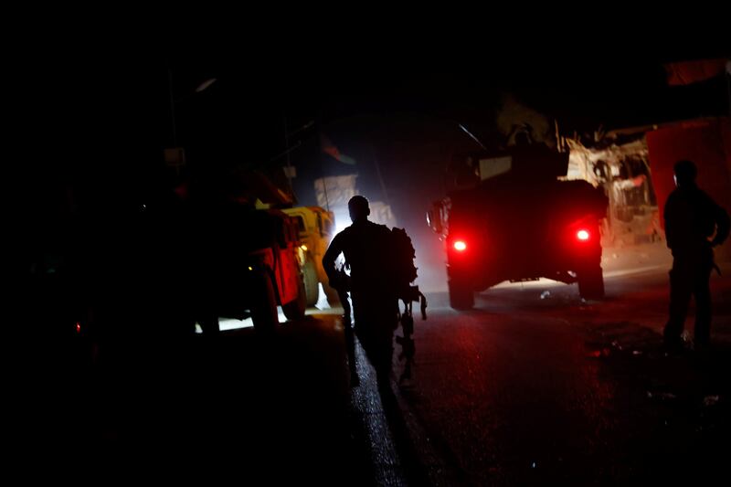 Members of the Afghan Special Forces leave after a combat mission against the Taliban in Kandahar province,  July 13, 2021.