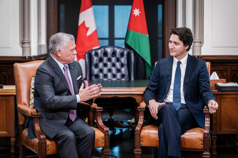 King Abdullah speaks with Mr Trudeau in Ottawa. AFP