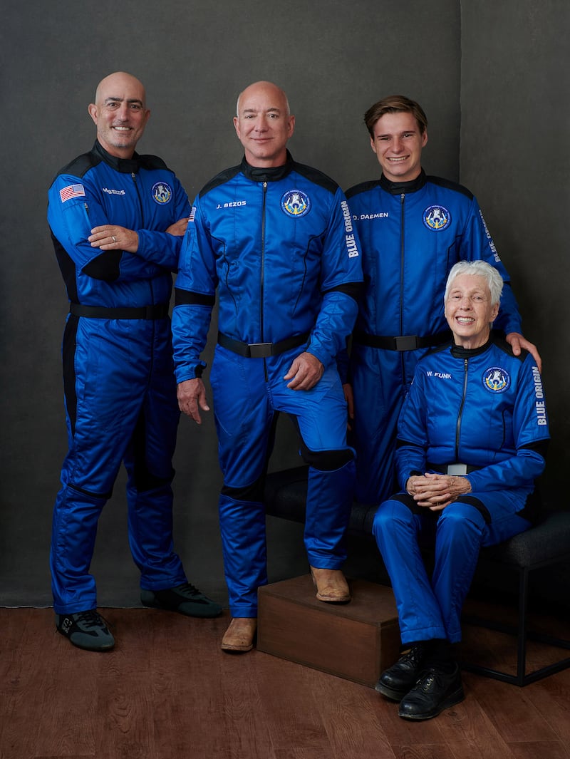 Jeff Bezos, his brother Mark Bezos, a private equity executive, Wally Funk and Oliver Daemen pose in an undated photograph.