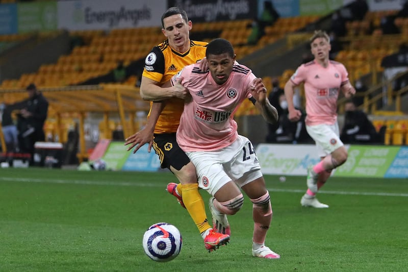 Wolverhampton Wanderers midfielder Daniel Podence fouls Sheffield United's Rhian Brewster. AFP