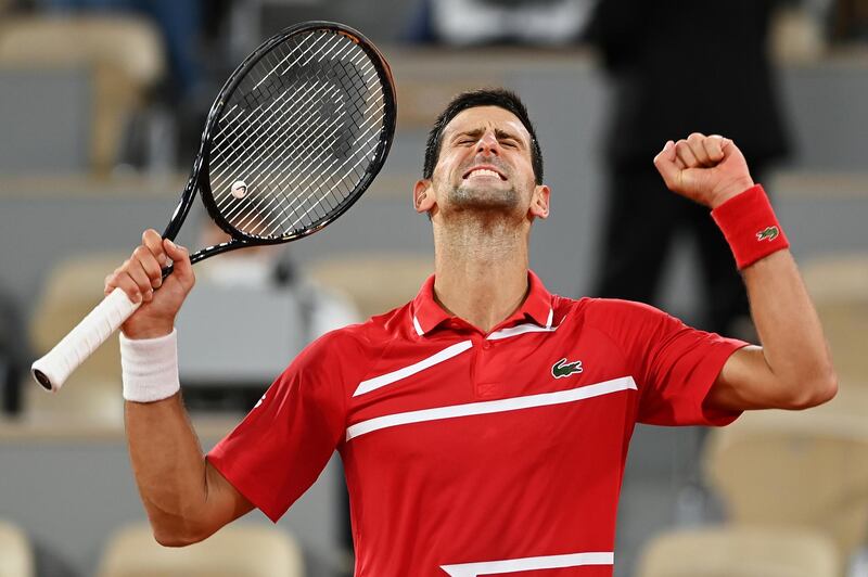 PARIS, FRANCE - OCTOBER 05: Novak Djokovic of Serbia celebrates after winning match point during his Men's Singles fourth round match against Karen Khachanov of Russia on day nine of the 2020 French Open at Roland Garros on October 05, 2020 in Paris, France. (Photo by Shaun Botterill/Getty Images)