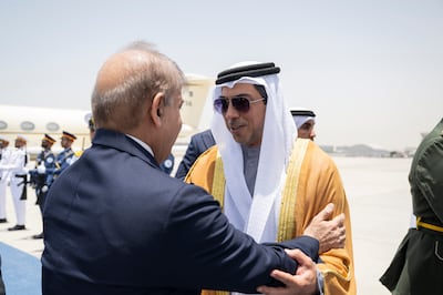 Sheikh Mansour bin Zayed, Vice President, Deputy Prime Minister and Chairman of the Presidential Court, greets Pakistan Prime Minister Shehbaz Sharif at Al Bateen Executive Airport in Abu Dhabi. Photo: UAE Presidential Court