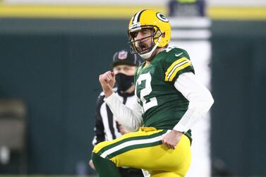 Green Bay Packers quarterback Aaron Rodgers celebrates after a touchdown pass to wide receiver Allen Lazard during the second half of a NFC Divisional Round playoff game against the Los Angeles Rams at Lambeau Field. Reuters