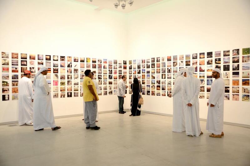 Visitors at the opening night of the #Sharjah1000 exhibition. Courtesy #Sharjah1000