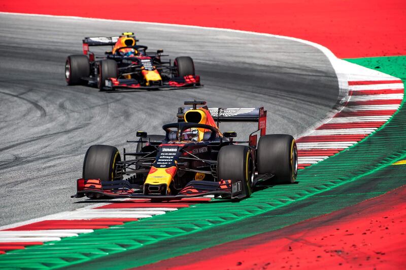 (FILES) In this file photo taken on June 30, 2019 Red Bull's Dutch driver Max Verstappen steers his car in front of Red Bull's French driver Pierre Gasly during the Austrian Formula One Grand Prix in Spielberg. Seven months after they last competed in earnest, the Formula One circus will push a post-lockdown ‘re-set’ button to open the 2020 season in Austria on July 4. / AFP / JOE KLAMAR
