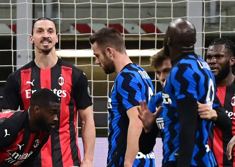 Zlatan Ibrahimovic and Romelu Lukaku continue to argue after being separated by teammates. EPA