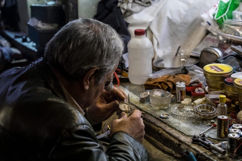 Samy Taha, 63, at work in Cairo. Time seems to stand still at the Armenian watchmaker shop, which has been in Attaba Square since 1903. AFP