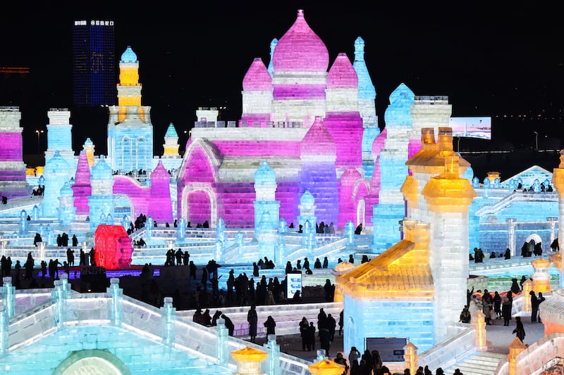 People visit the 25th Harbin Ice and Snow World in Harbin, in China’s northern Heilongjiang province. AFP