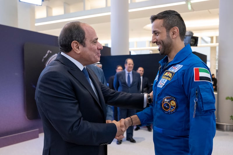 Mr El Sisi greets Dr Al Neyadi during the reception at the new Abu Dhabi International Airport
