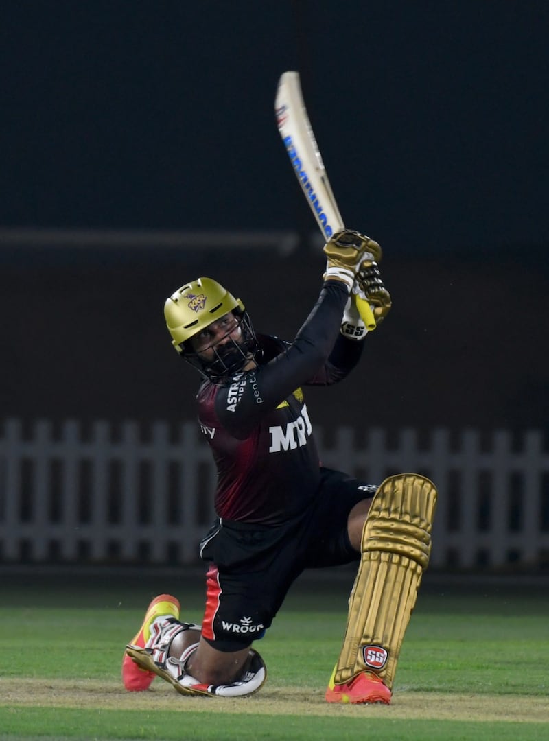 Dinesh Karthik bats during a centre wicket practice with Kolkata Knight Riders in Abu Dhabi.