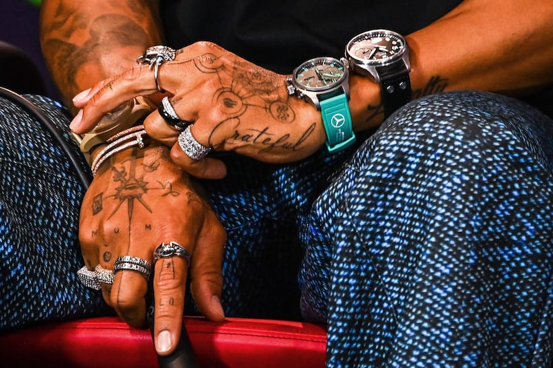 Lewis Hamilton wears rings, watches, and bracelets during the Miami Grand Prix press conference in response to the FIA's ban on jewellery and piercings. AFP
