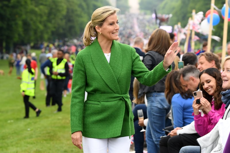 Sophie, Countess of Wessex, wears a green Giuliva Heritage blazer with white trousers to attend the Big Jubilee Lunch. Getty Images 
